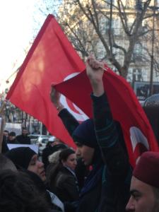 A Tunisian demonstrator in Paris, France, as the Tunisian community there celebrated the first anniversary of the revolution on January 14, 2012. (C) Bernard J. Henry/AWC