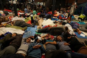 Syrian_refugees_having_rest_at_the_floor_of_Keleti_railway_station._Refugee_crisis._Budapest,_Hungary,_Central_Europe,_5_September_2015