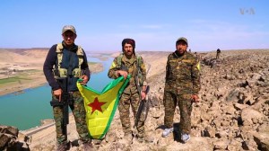 YPG-SDF_fighters_near_the_Euphrates_east_of_Raqqa